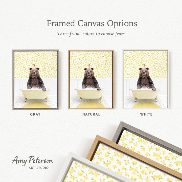 The image is a framed canvas option featuring three different framed pictures of a bear sitting in a bathtub, each with a different frame color: gray, natural, and white.