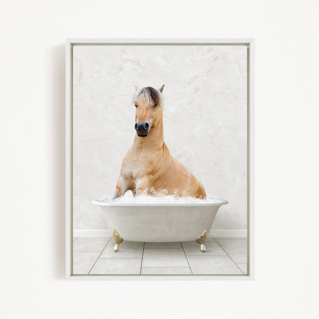 A light brown horse is sitting in a white bathtub filled with water, creating a whimsical and playful scene.