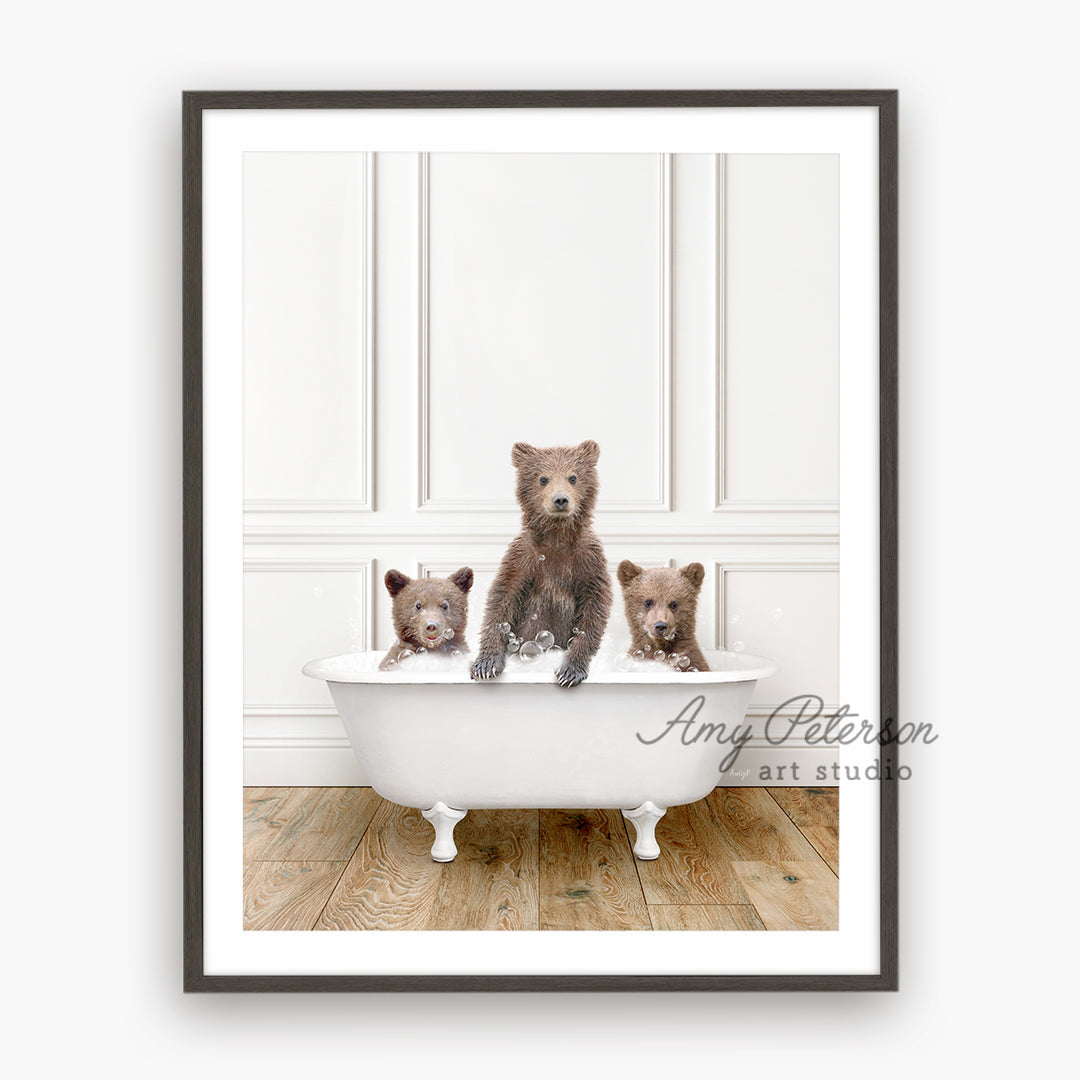 a picture of three bears in a bathtub