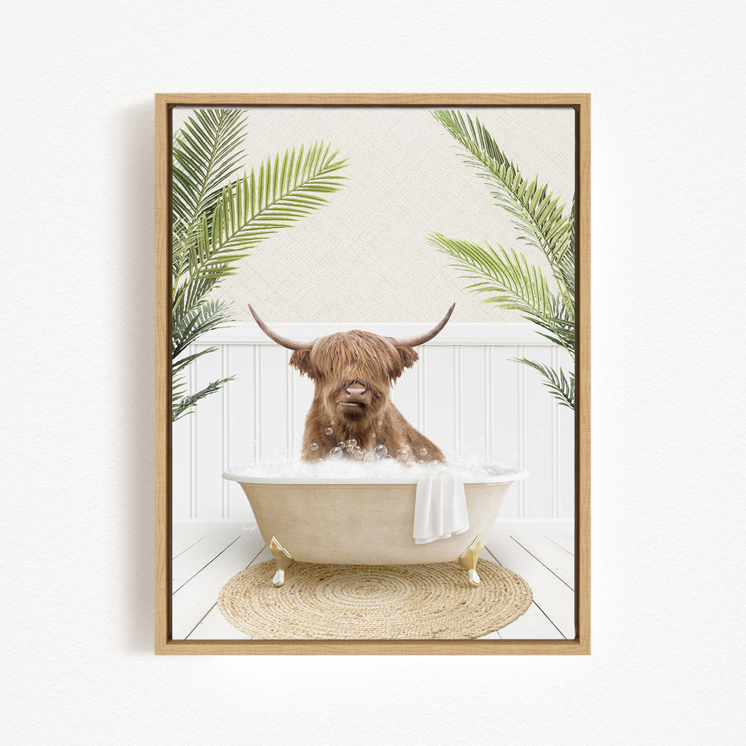 A brown cow with long horns is sitting in a white bathtub filled with water, surrounded by green palm leaves.