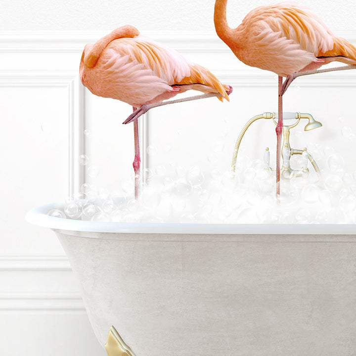 two flamingos standing in a bathtub with bubbles