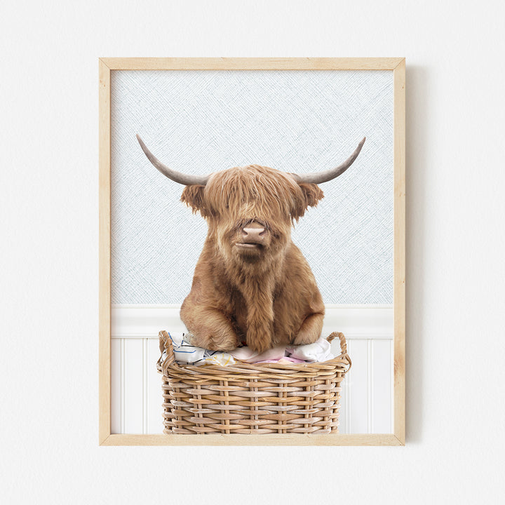 a picture of a brown cow sitting in a basket