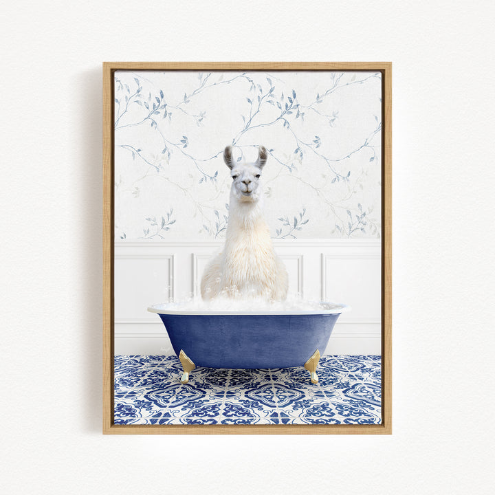 A white llama sitting in a blue bathtub filled with water, surrounded by a blue and white patterned tile floor.