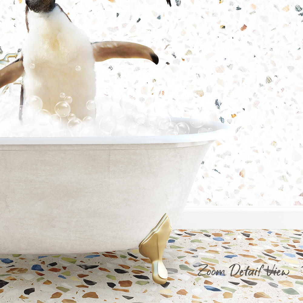 A penguin standing in a bathtub filled with bubbles, with a mosaic floor in the background.