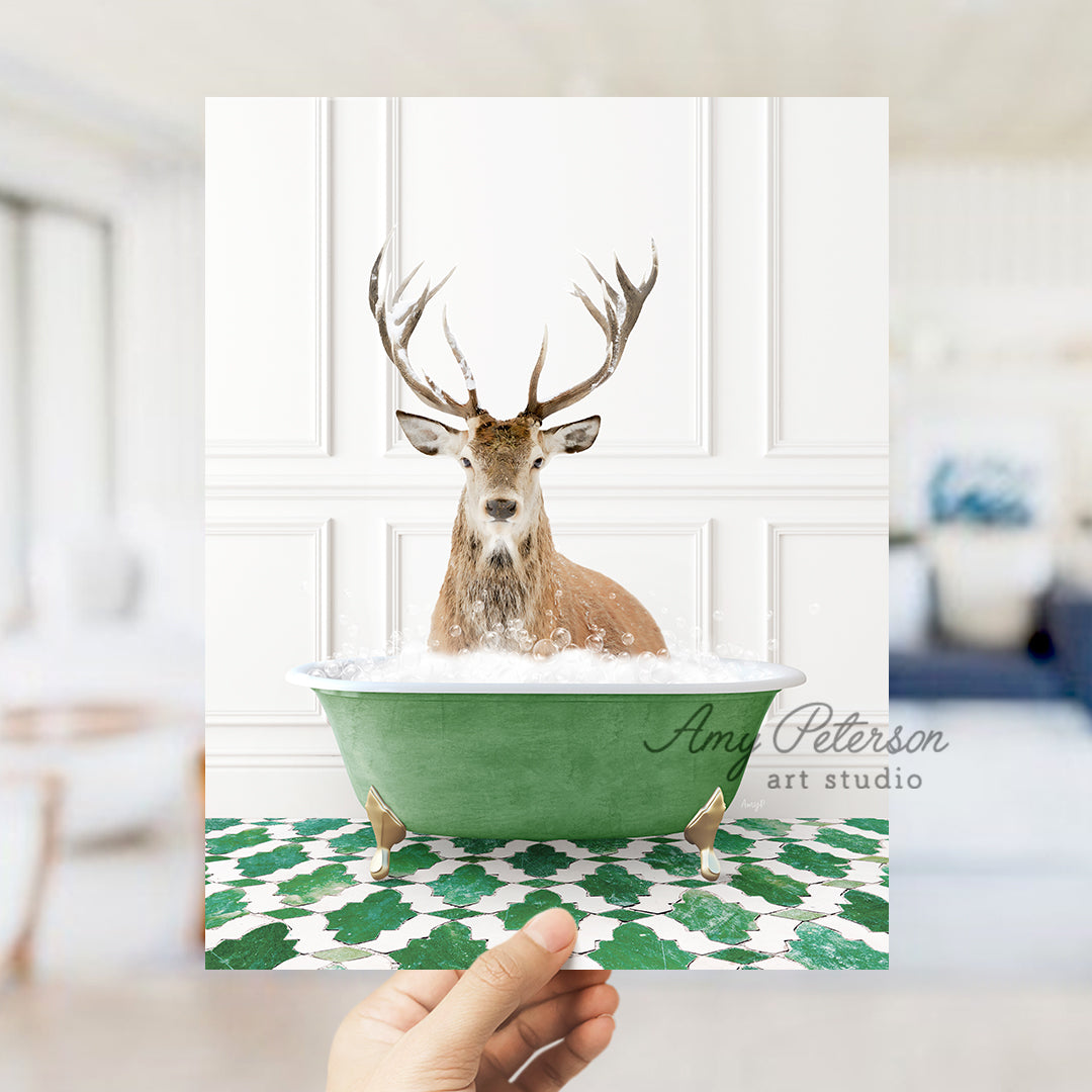 a hand holding a card with a deer in a bathtub