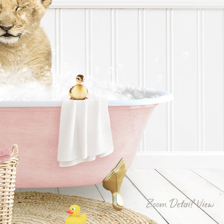 A pink bathtub filled with bubbles, with a small yellow rubber duck sitting on the edge and a small brown bird figurine perched on the rim.