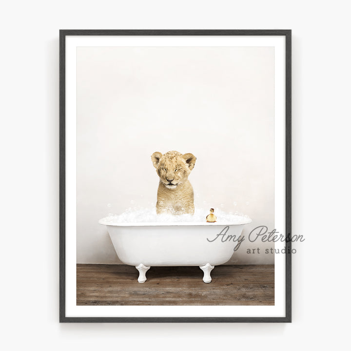 a picture of a lion cub in a bathtub