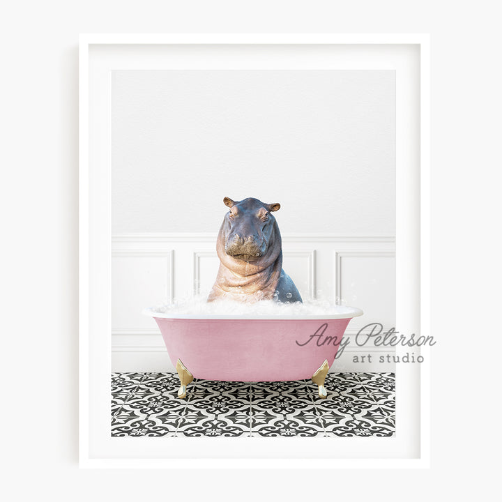 a hippo is sitting in a pink bathtub