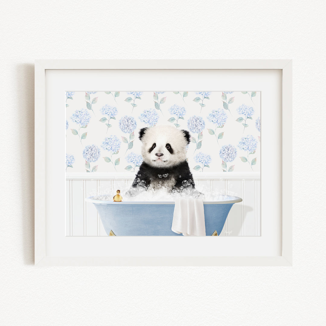 A panda bear sitting in a blue bathtub filled with bubbles, surrounded by a floral patterned wall.