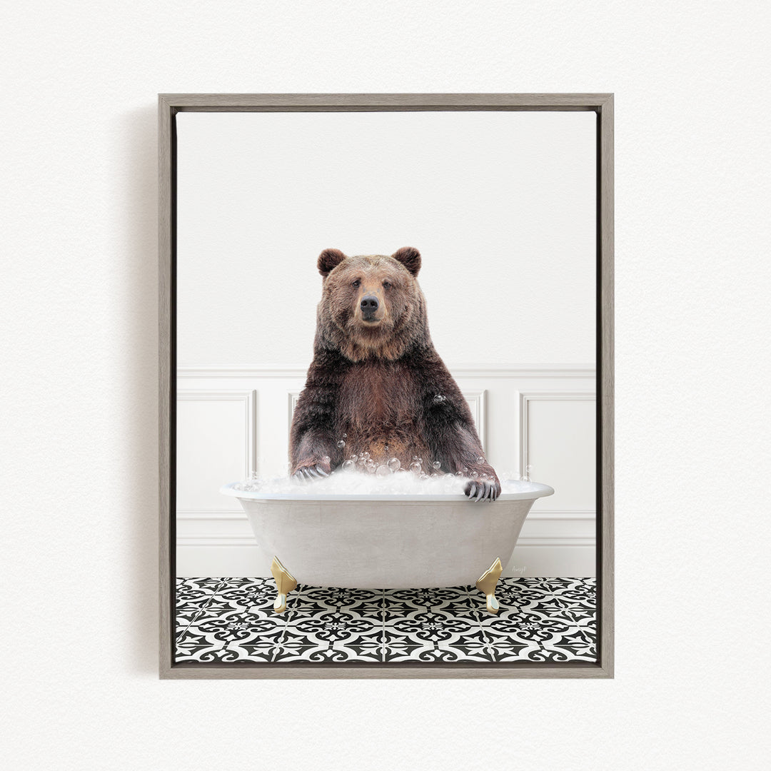 A brown bear sitting in a white bathtub filled with bubbles, creating a whimsical and playful scene.
