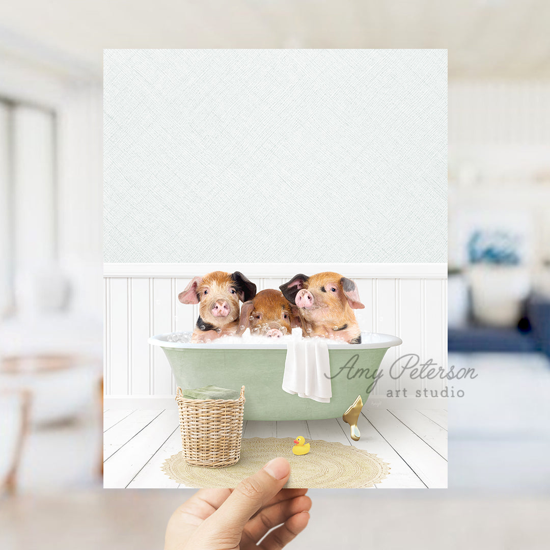 a person holding a card with three puppies in a bathtub