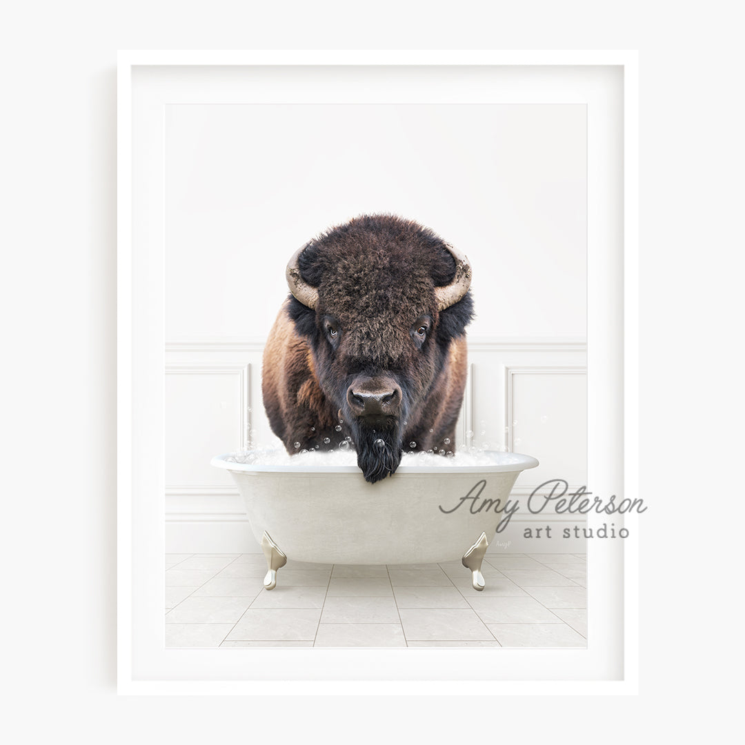 a bison is taking a bath in a bathtub