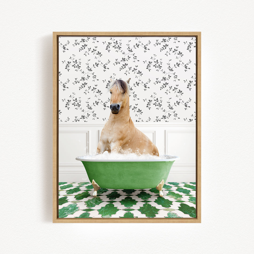 A light brown horse is sitting in a green bathtub filled with water, surrounded by a patterned green and white floor.