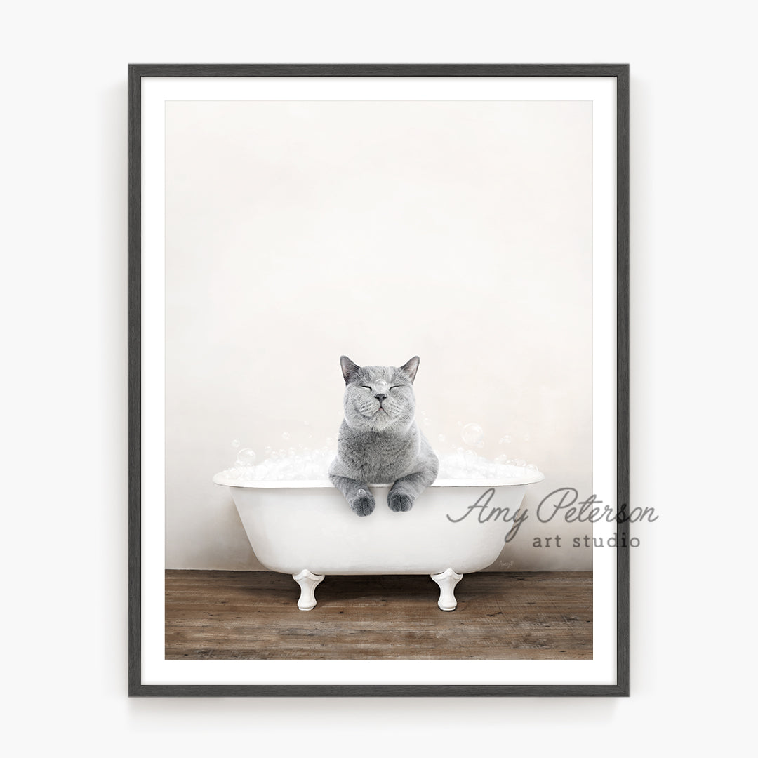 a cat sitting in a bathtub with water in it