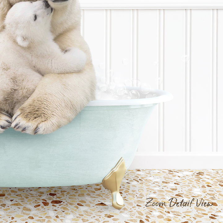 A polar bear cub sitting in a light blue bathtub, with its mother's head resting on its body.