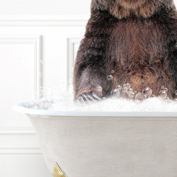 a brown bear sitting in a bathtub filled with bubbles