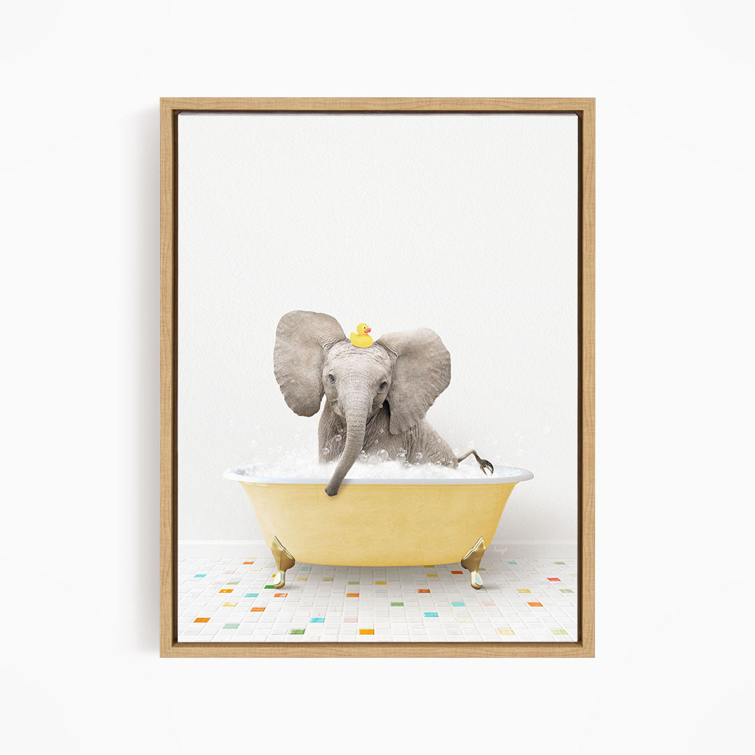 A gray elephant is sitting in a yellow bathtub filled with water, with a rubber duck floating on its head.