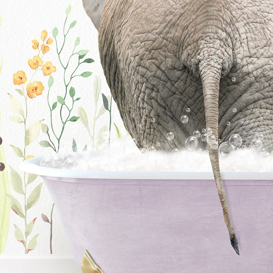 an elephant taking a bath in a bathtub