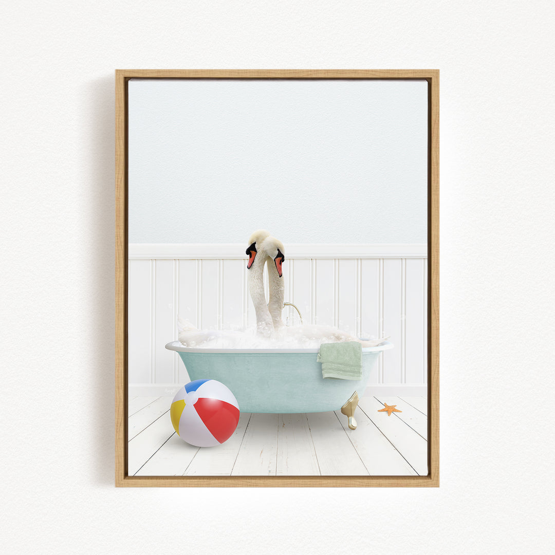 A swan is sitting in a bathtub filled with bubbles, surrounded by a beach ball and a towel, creating a whimsical and playful scene.