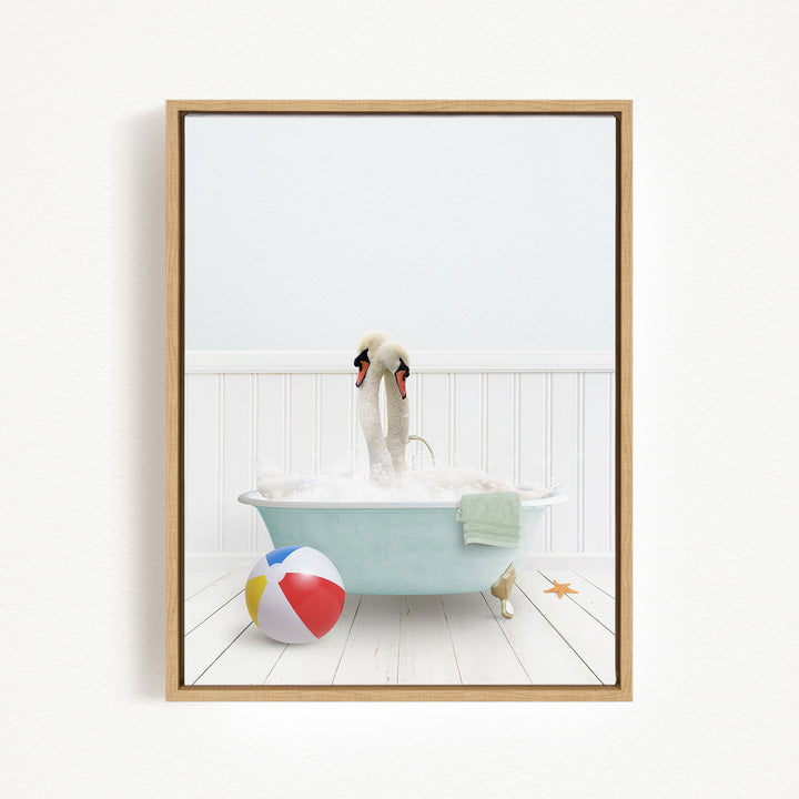 A swan is sitting in a bathtub filled with bubbles, surrounded by a beach ball and a towel, creating a whimsical and playful scene.