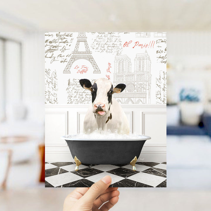 A cow is sitting in a bathtub filled with water, surrounded by various Paris-themed elements such as the Eiffel Tower and other landmarks.