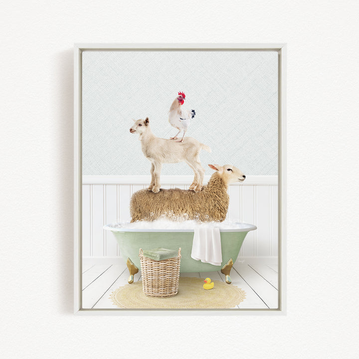 A framed image depicting a sheep standing on a tub filled with bubbles, with a chicken perched on top and a lamb lying on the tub's edge.