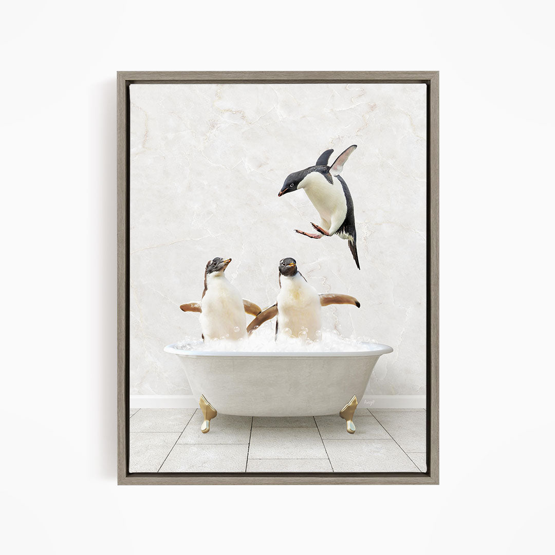 A framed image depicting two penguins sitting in a bathtub, with one penguin flying towards the other penguin.