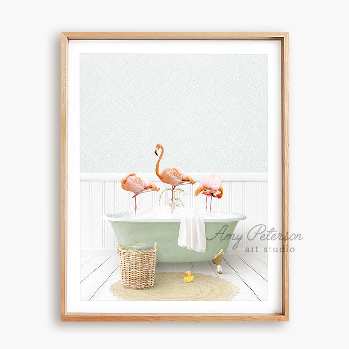 a picture of three flamingos in a bathtub