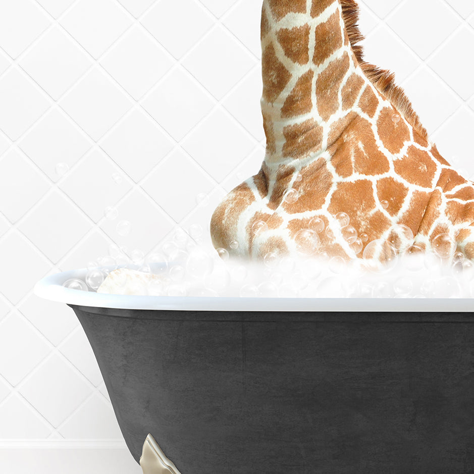 a giraffe sitting in a bathtub with foam on it