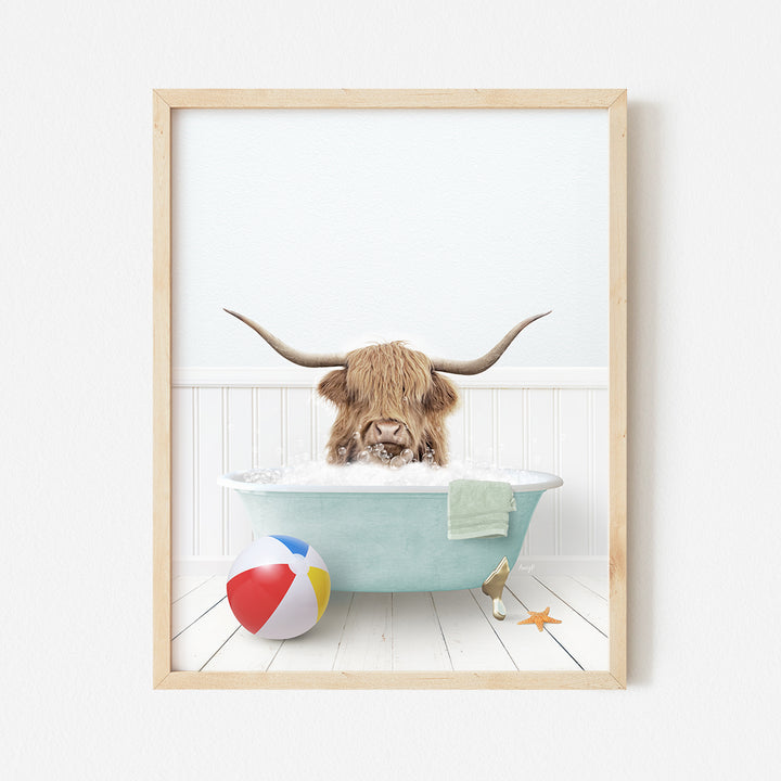 a picture of a bull in a bathtub with a beach ball