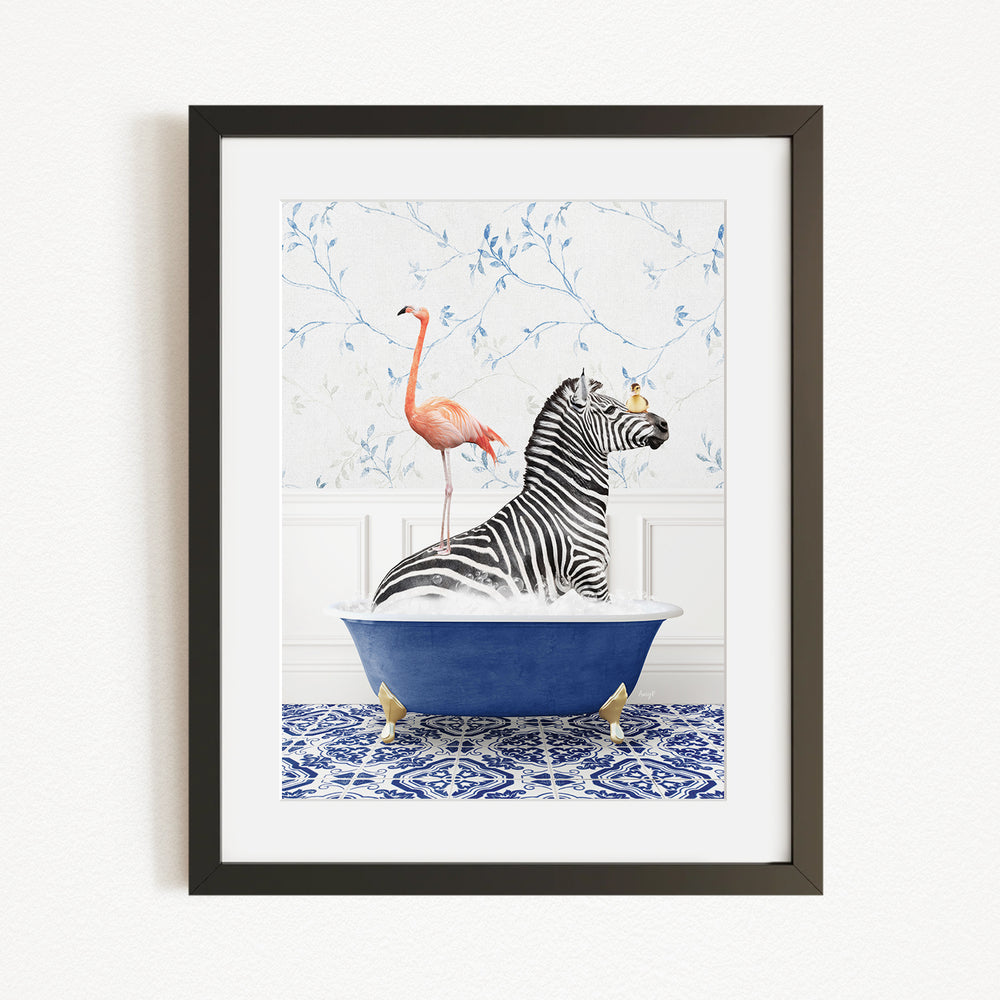 A framed image depicting a zebra sitting in a blue bathtub, with a flamingo standing on its back and a bird perched on its head.