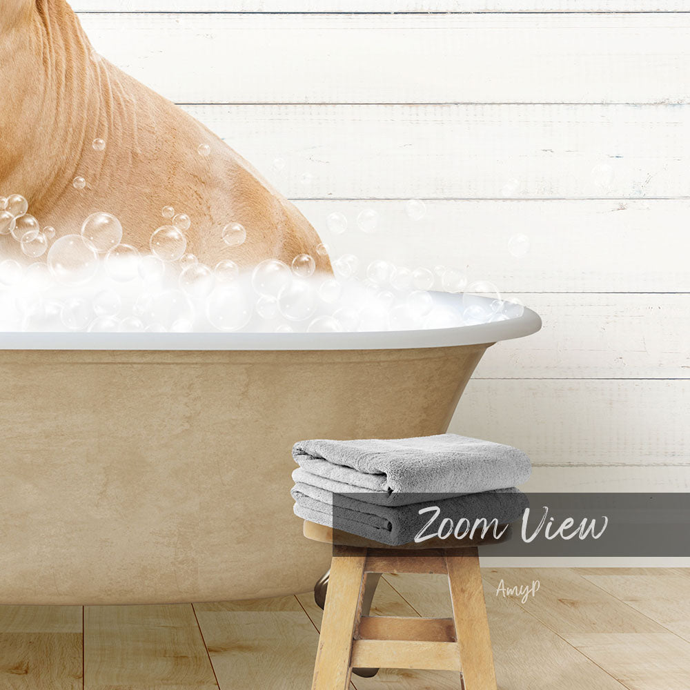 A bathtub filled with bubbles, with a dog sitting inside and enjoying a bath. There are towels and a stool nearby, suggesting a relaxing bathing experience.