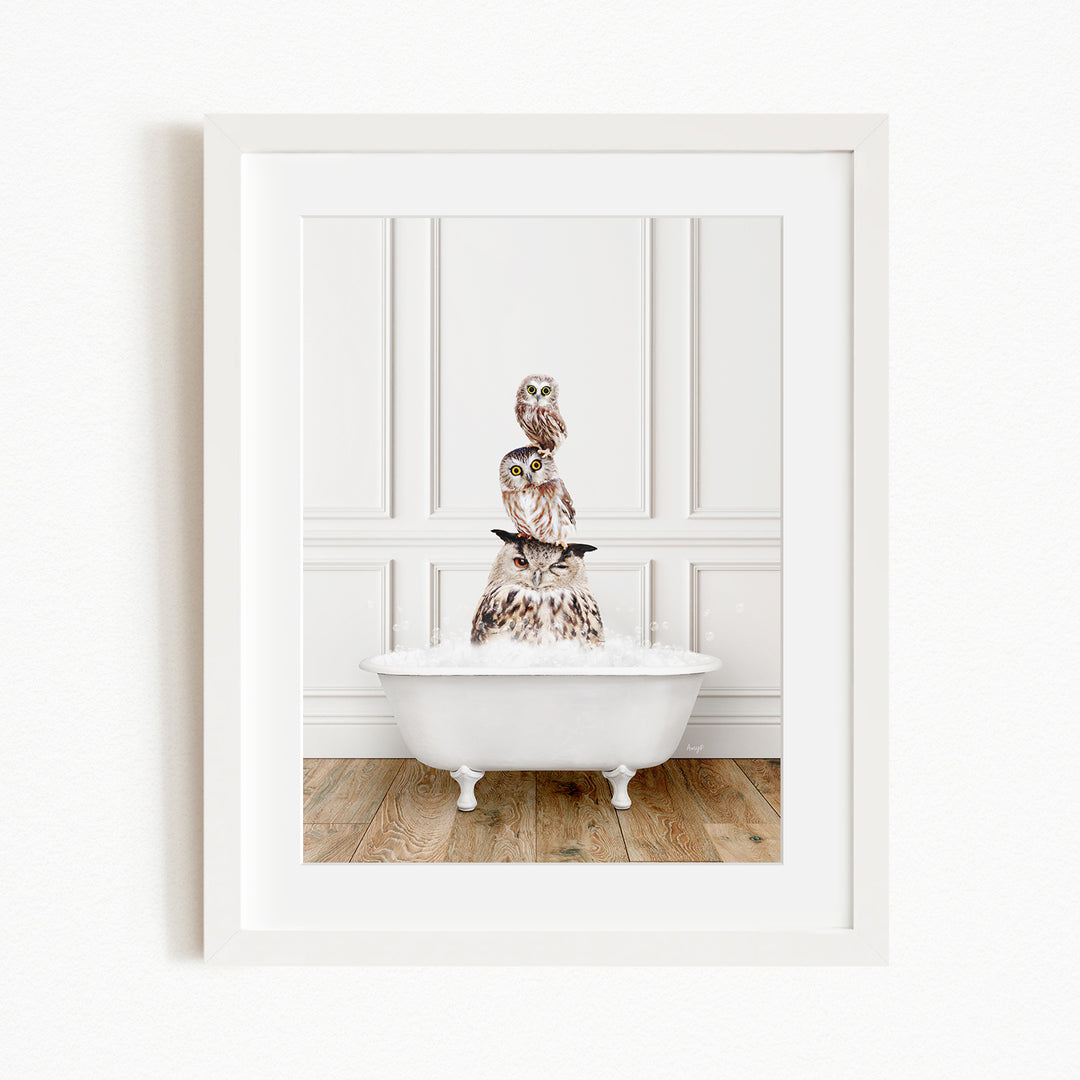 A white bathtub filled with water, with a stack of owls perched on top, creating a whimsical and playful scene.