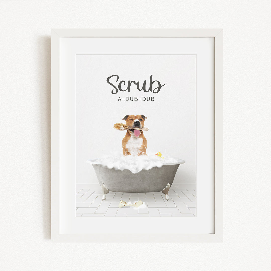 A dog sitting in a bathtub filled with bubbles, holding a toy in its mouth, with the text "Scrub A-DUB-DUB" above the image.