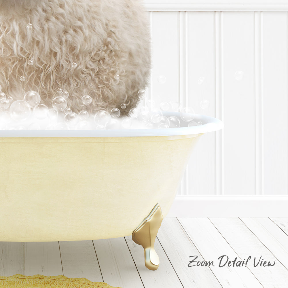 A fluffy white dog is sitting in a yellow bathtub filled with bubbles, creating a cozy and playful scene.