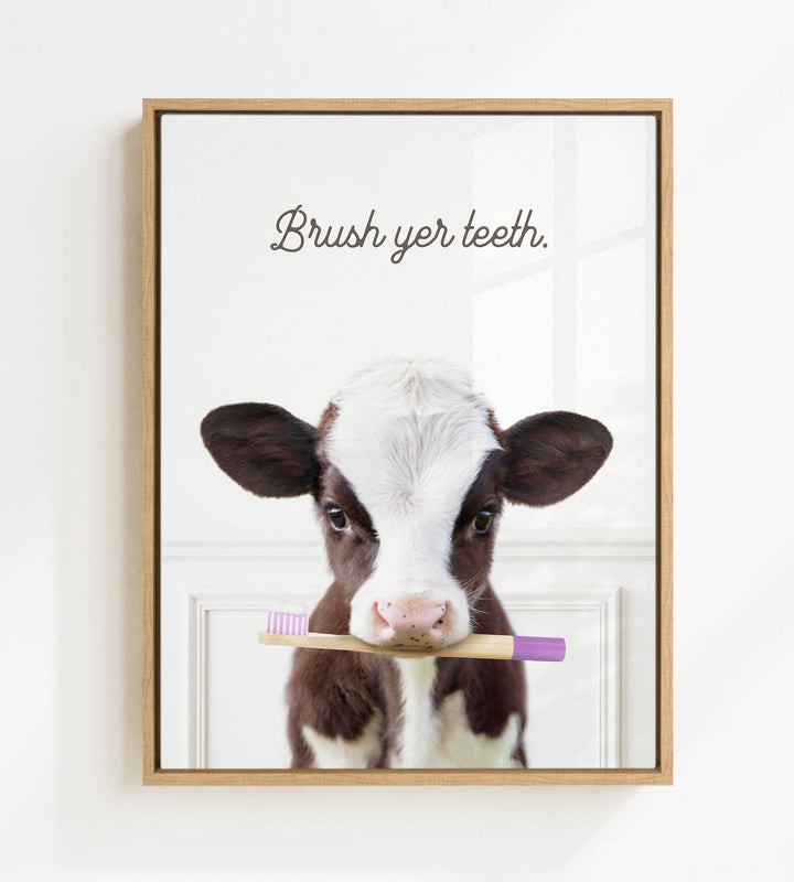 A brown and white cow holding a purple toothbrush in its mouth, with the text "Brush yer teeth."