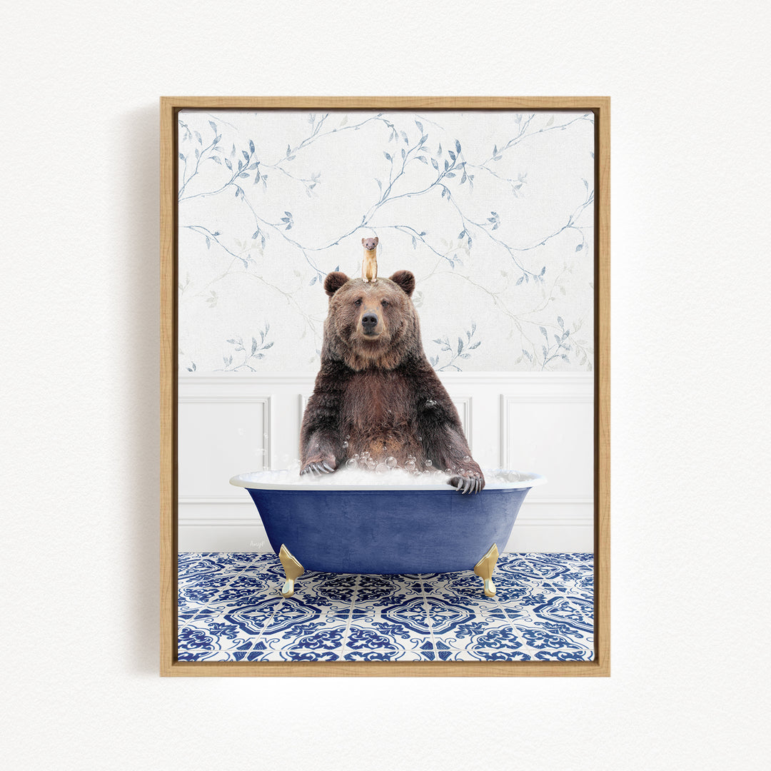 A brown bear sitting in a blue bathtub, surrounded by a floral patterned wall.