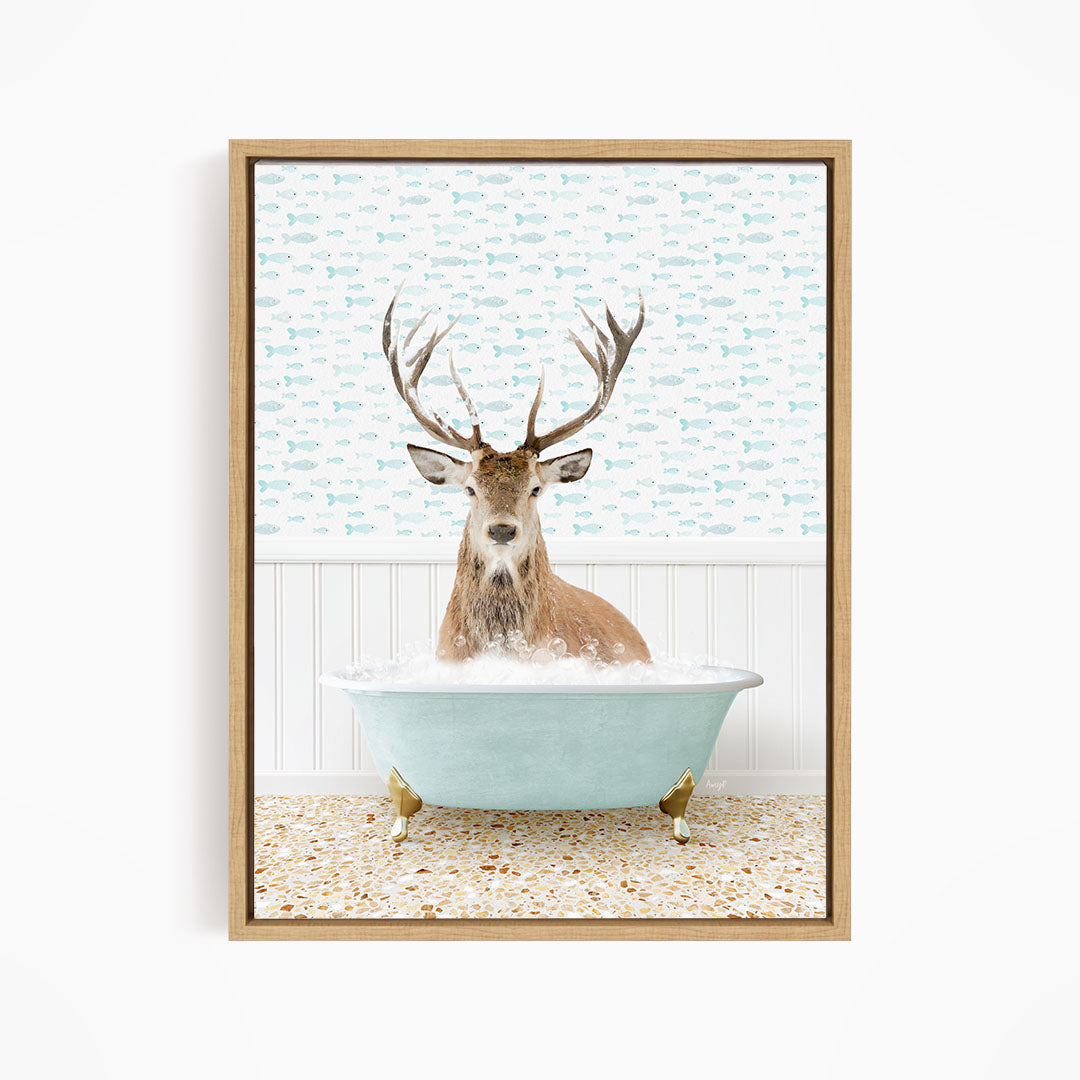 A deer with antlers is sitting in a bathtub filled with bubbles, surrounded by a pattern of fish.