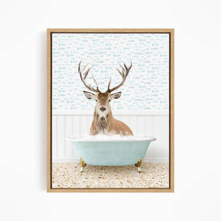 A deer with antlers is sitting in a bathtub filled with bubbles, surrounded by a pattern of fish.