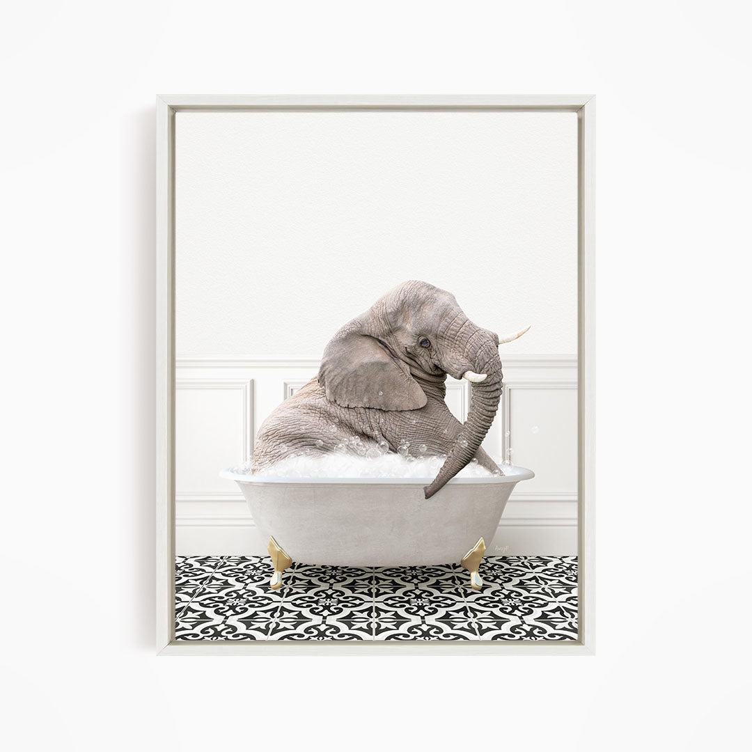 A gray elephant is sitting in a white bathtub filled with water, surrounded by a black and white patterned floor.