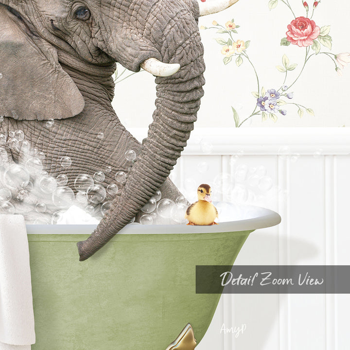 An elephant is taking a bath in a green tub, with a small yellow duck sitting on the edge of the tub.