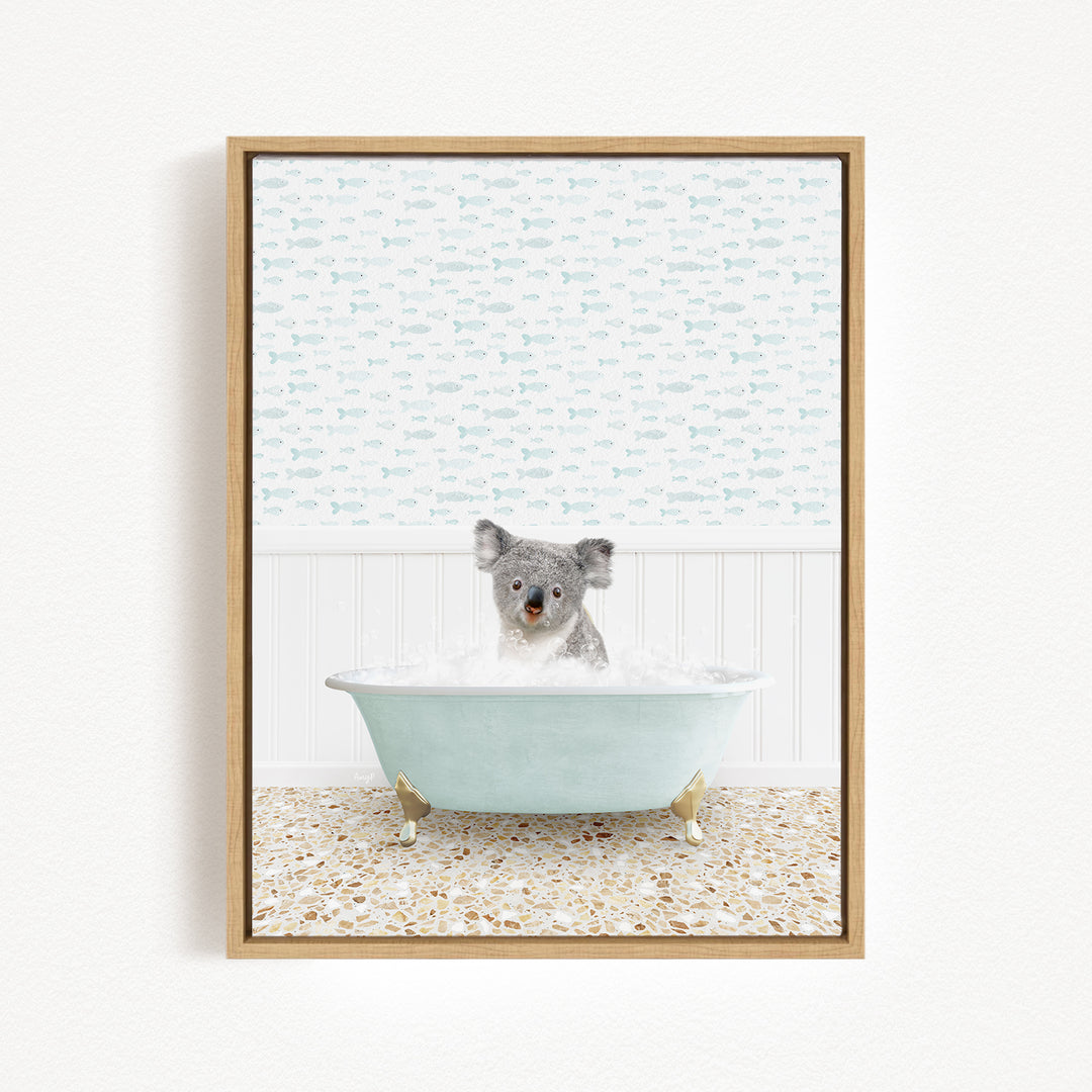 A koala bear sitting in a bathtub filled with bubbles, surrounded by a patterned wall and a tiled floor.