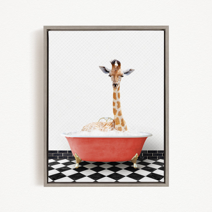 A giraffe is sitting in a red bathtub filled with water, creating a whimsical and playful scene.