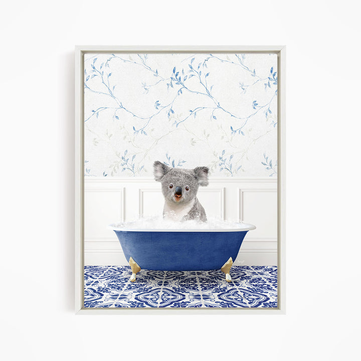 A koala bear sitting in a blue bathtub filled with water, surrounded by a blue and white patterned floor.