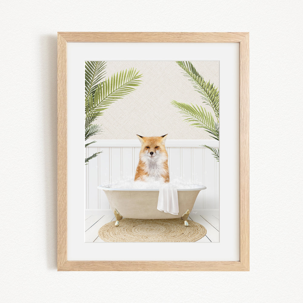 A fox is sitting in a bathtub filled with bubbles, surrounded by green plants.