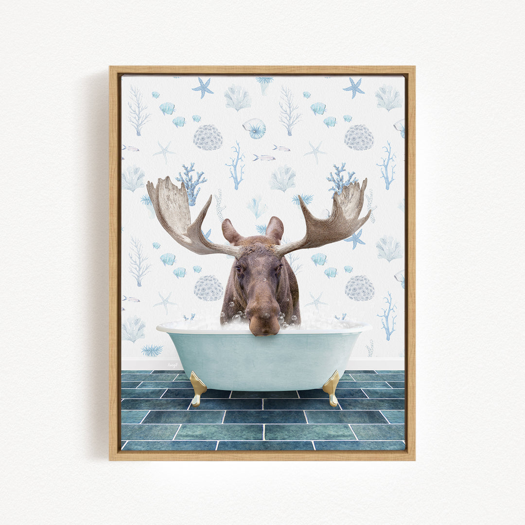 A moose is sitting in a bathtub filled with water, surrounded by a pattern of blue and white seashells and starfish.