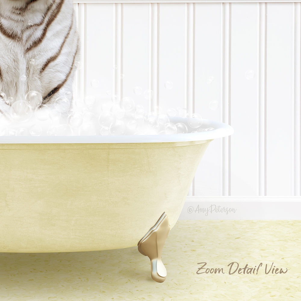 A white and black striped cat is sitting in a yellow bathtub filled with bubbles, with a white wall and a text overlay that reads "Zoom Detail View".