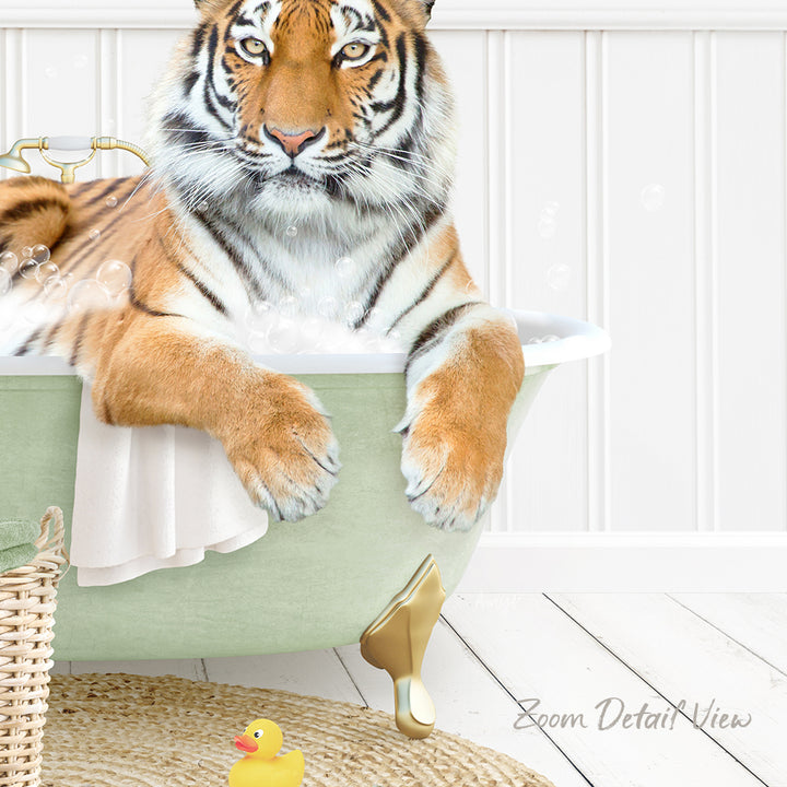 A tiger is sitting in a green bathtub filled with water, surrounded by bubbles, with a rubber duck nearby.