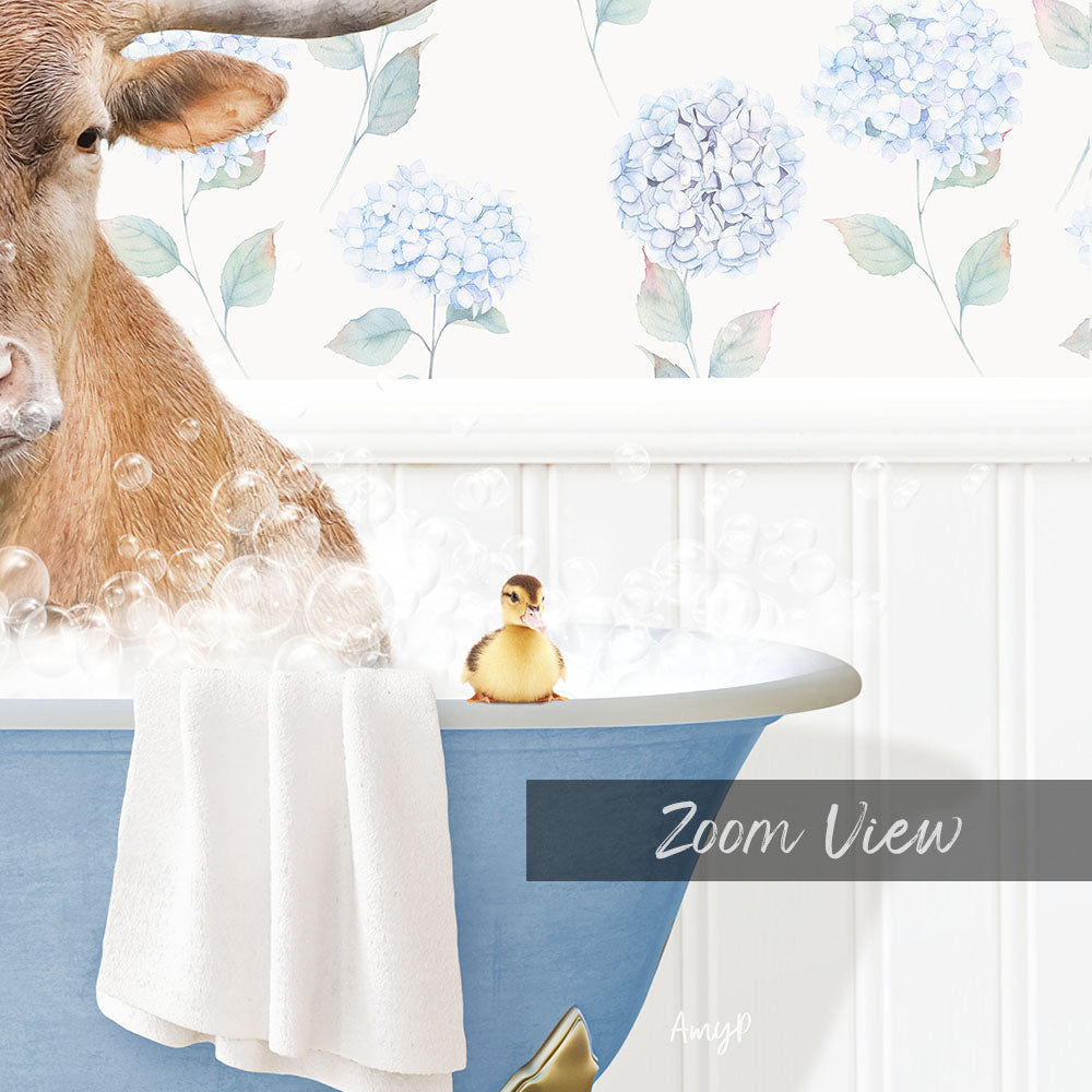 A cow is sitting in a bathtub filled with bubbles, with a small yellow duck sitting on the edge of the tub.