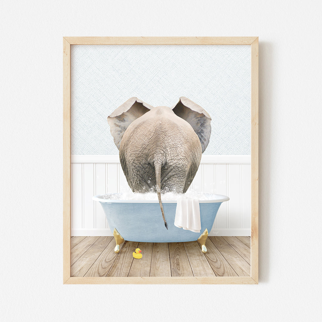 a picture of an elephant taking a bath